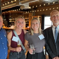 GVSU Alumni networking with Dean